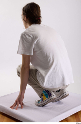 Man White Casual Shirt Jeans Slim Kneeling Studio photo references